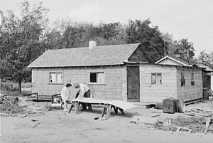 Workman builds house