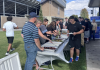 Forks and first downs: Hermiston Football enjoys team meal before kicking off season with win
